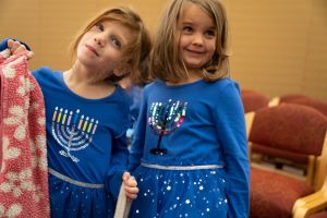 family learning hanukkah